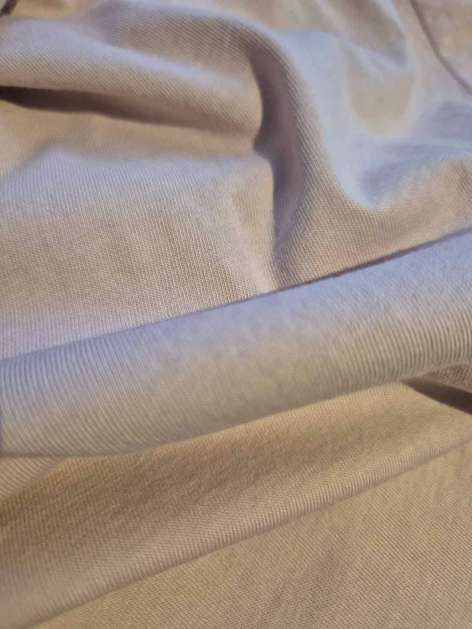POLERA MANCA CORTA ASIMÉTRICA