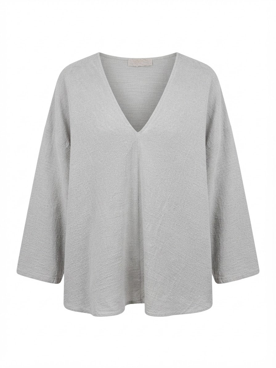 BLUSA HOLGADA CON ESCOTE EN V