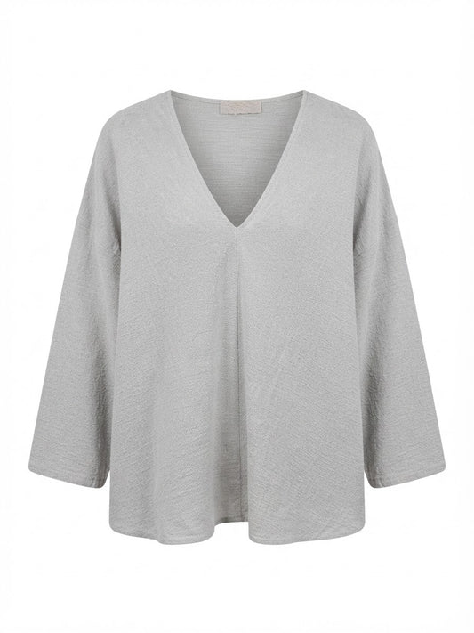 BLUSA HOLGADA CON ESCOTE EN V